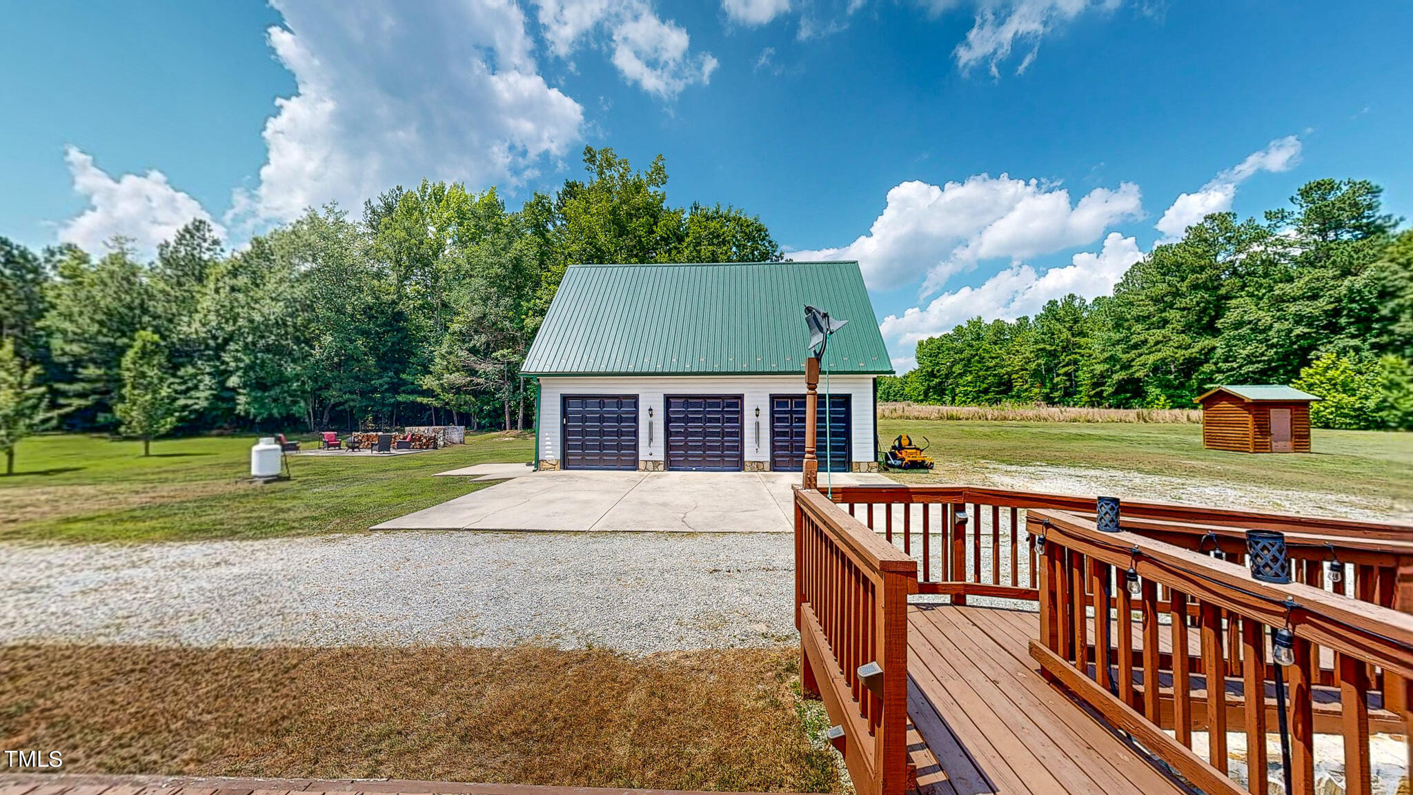 9529 Hester Road Hurdle Mills, NC 27541 - Photo 79 of 85 a view of house with outdoor space and trees