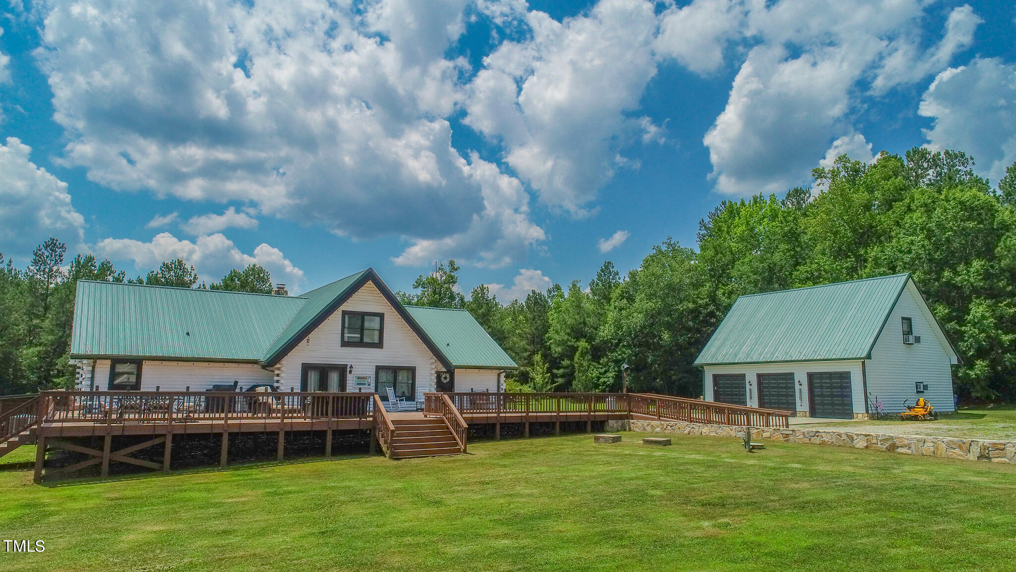 9529 Hester Road Hurdle Mills, NC 27541 - Photo 8 of 85 a front view of house with yard and green space