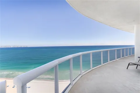a view of balcony with an ocean