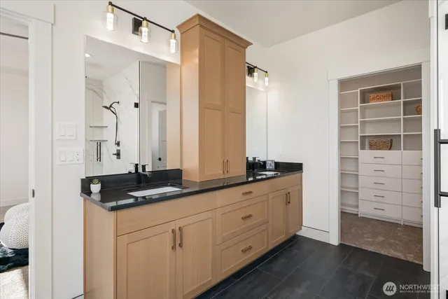 a view of a living room and floor to ceiling window