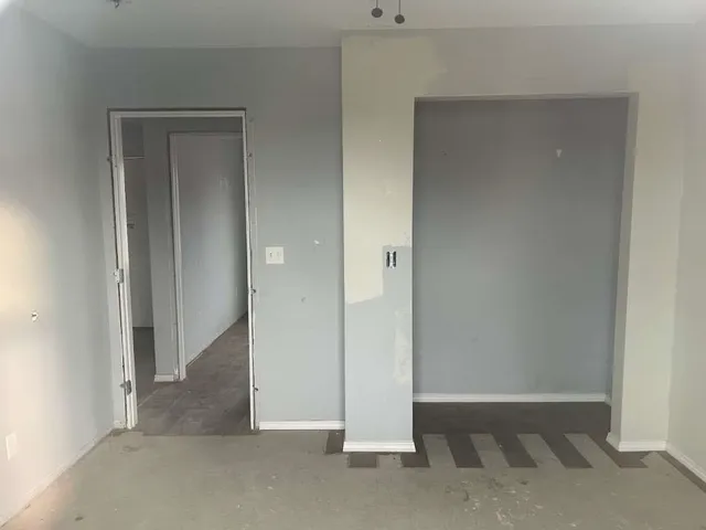 an empty room with closet