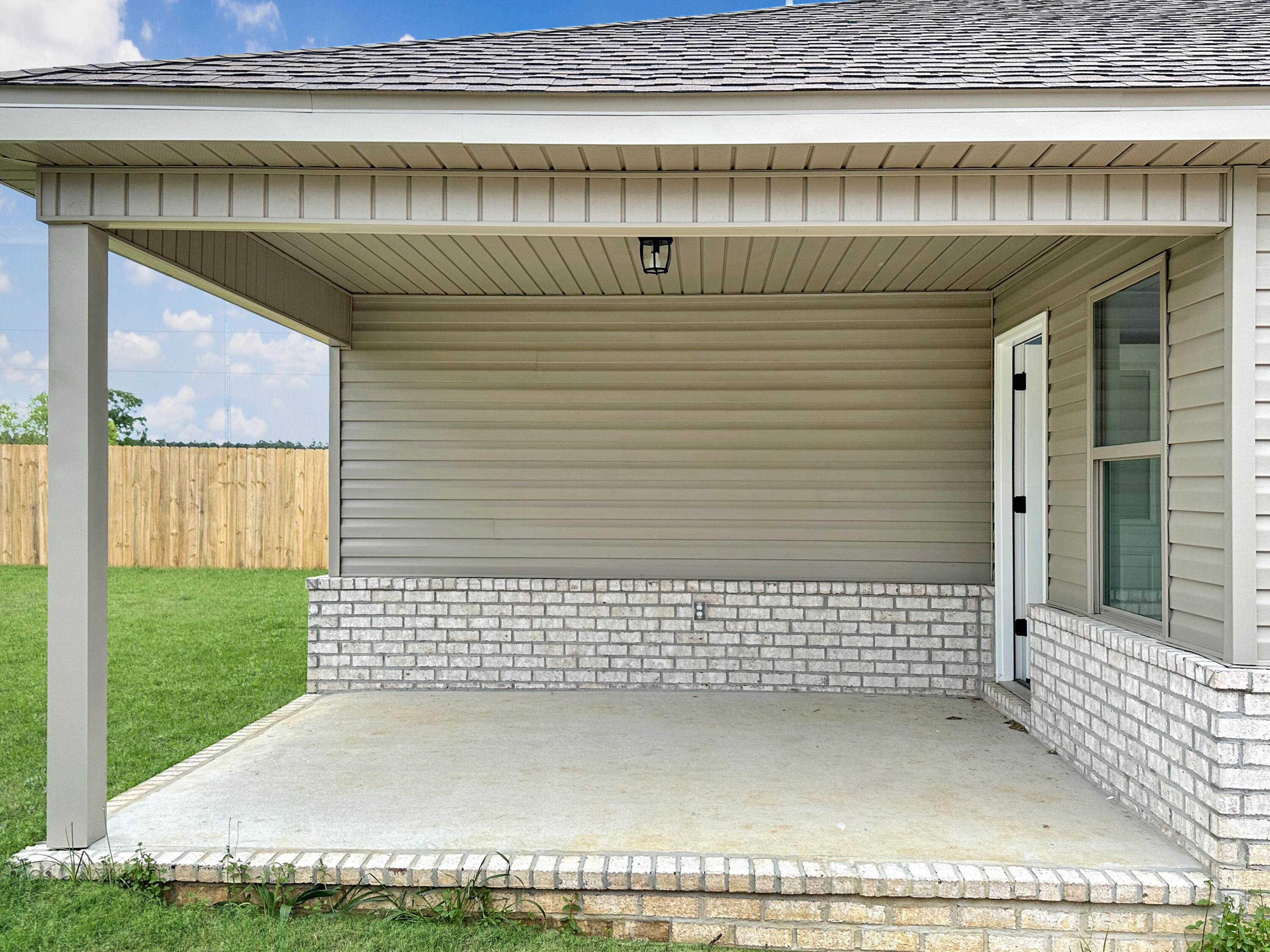 5771 Monroe Street Baker, FL 32531 - Photo 19 of 23 a view of a wooden door