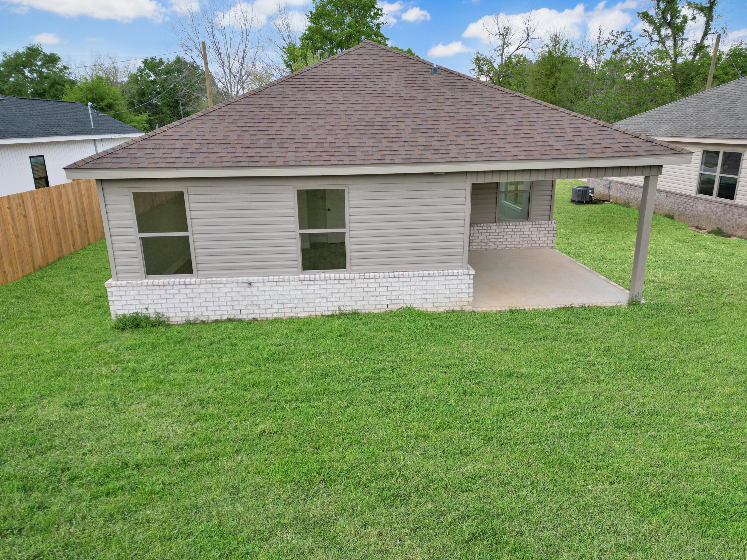 5771 Monroe Street Baker, FL 32531 - Photo 5 of 23 a front view of house with yard and green space