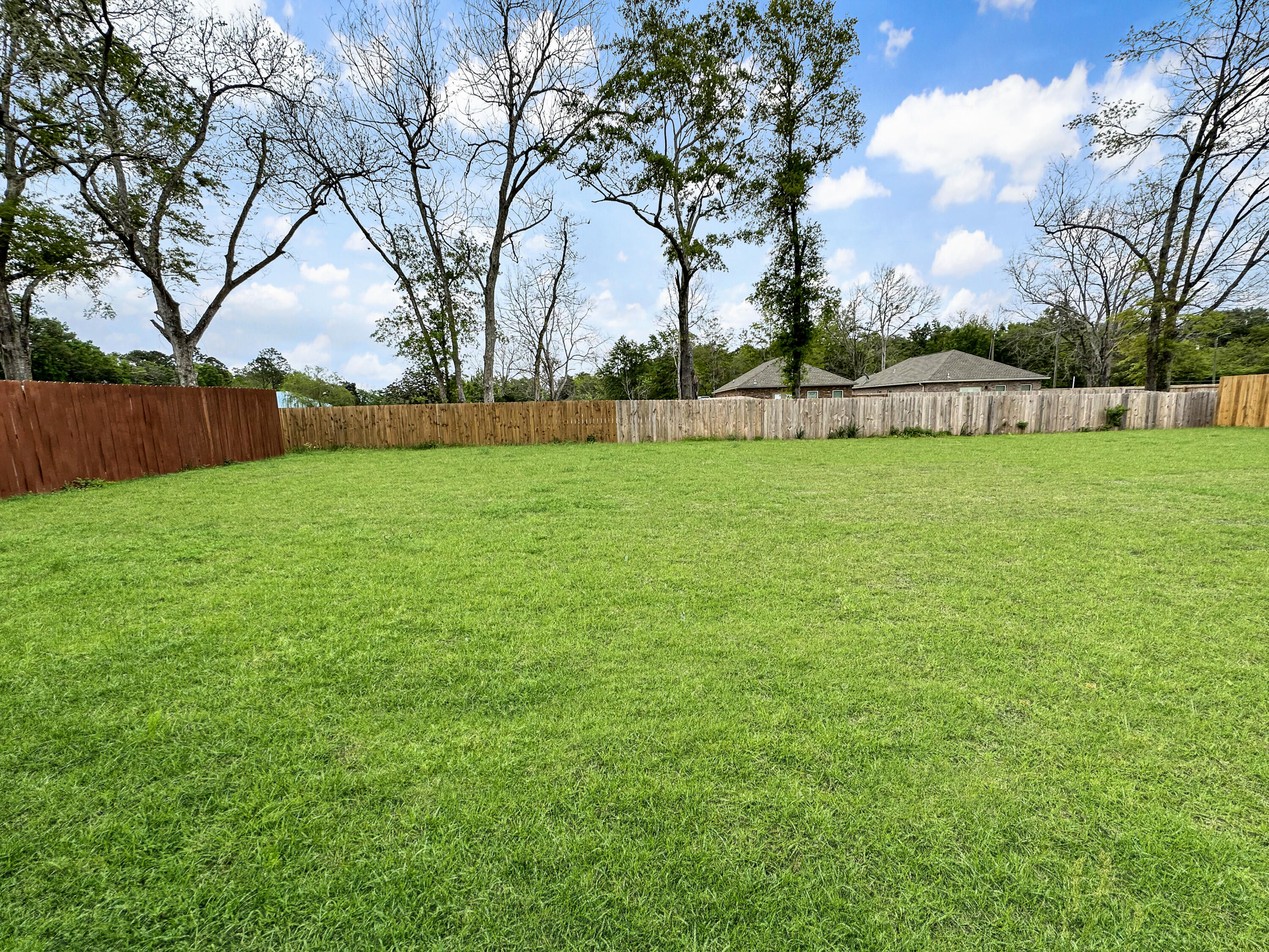 5771 Monroe Street Baker, FL 32531 - Photo 6 of 23 a view of an outdoor space and a yard
