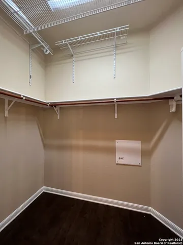 a view of a room with rack on the wall