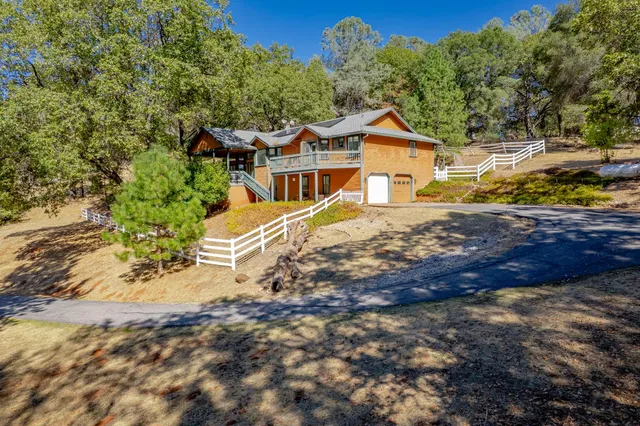 a view of work space with furniture and window