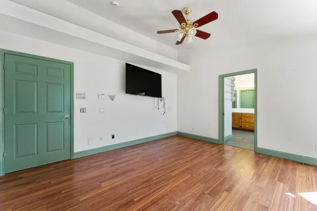 a view of outdoor space with wooden floor and fence