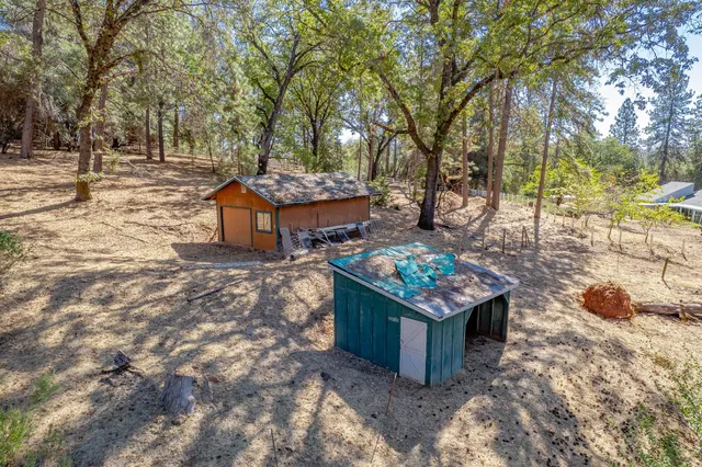 a house view with a garden space