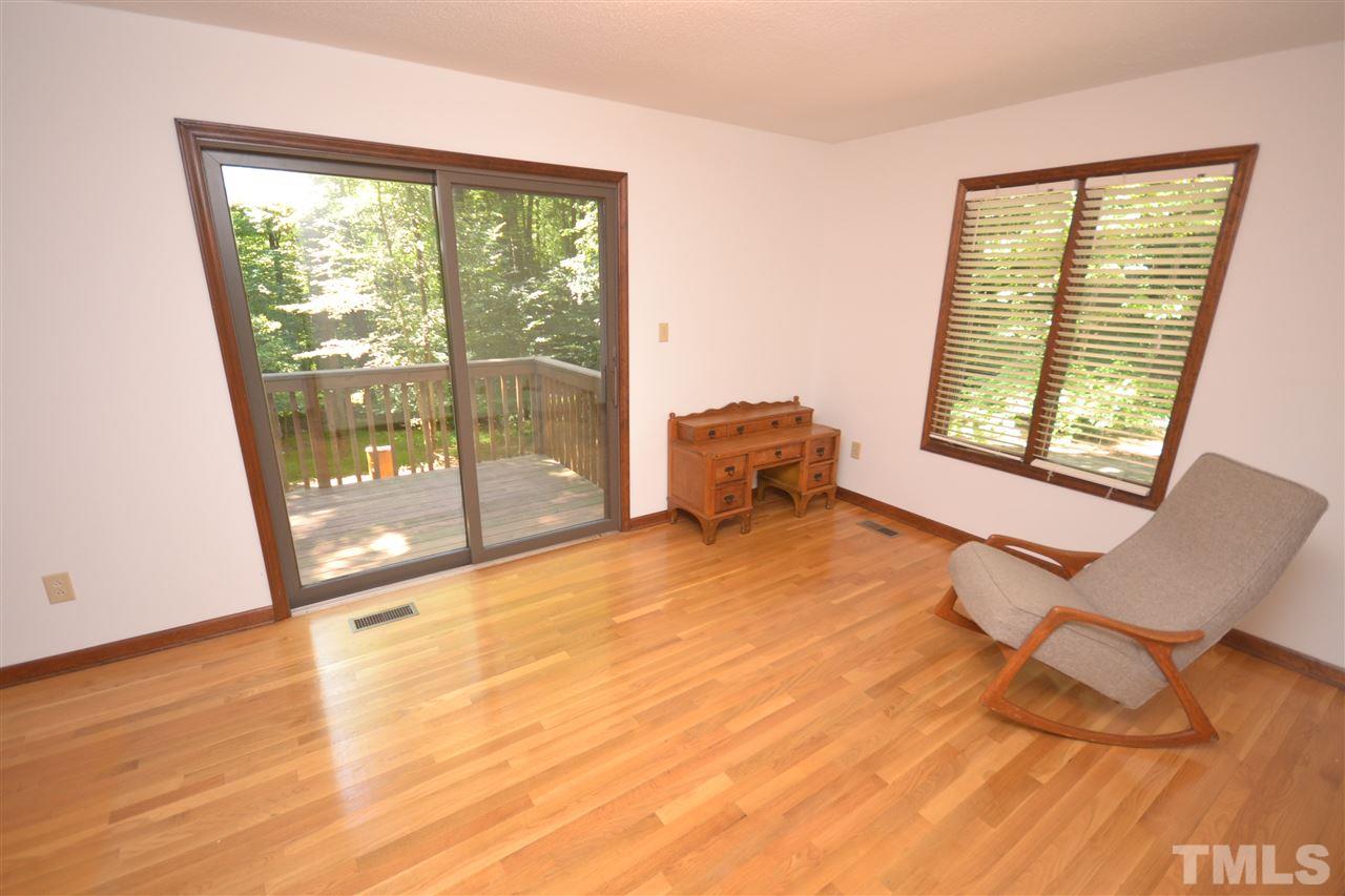 2400 Windsor Trail Raleigh, NC 27615 - Photo 12 of 19 a view of empty room with wooden floor and fan