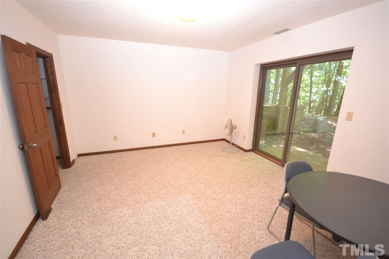 2400 Windsor Trail Raleigh, NC 27615 - Photo 16 of 19 a view of a room with furniture and a window