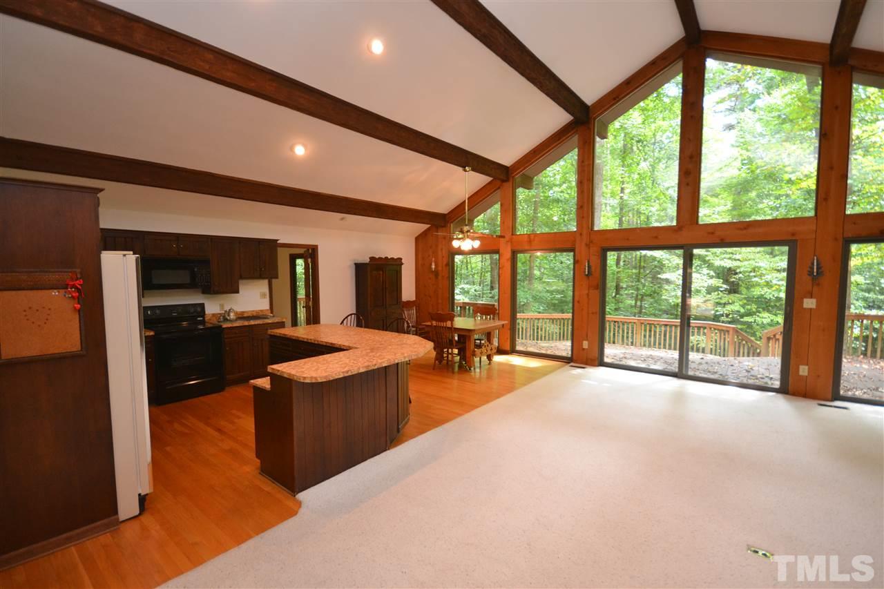 2400 Windsor Trail Raleigh, NC 27615 - Photo 6 of 19 a large living room with large windows