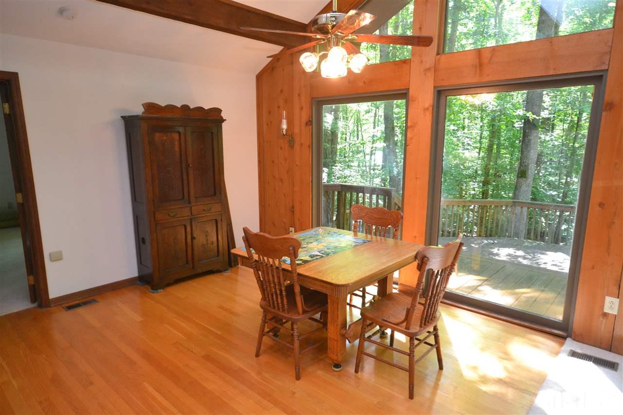 2400 Windsor Trail Raleigh, NC 27615 - Photo 8 of 19 a view of a dining room with furniture window and outside view