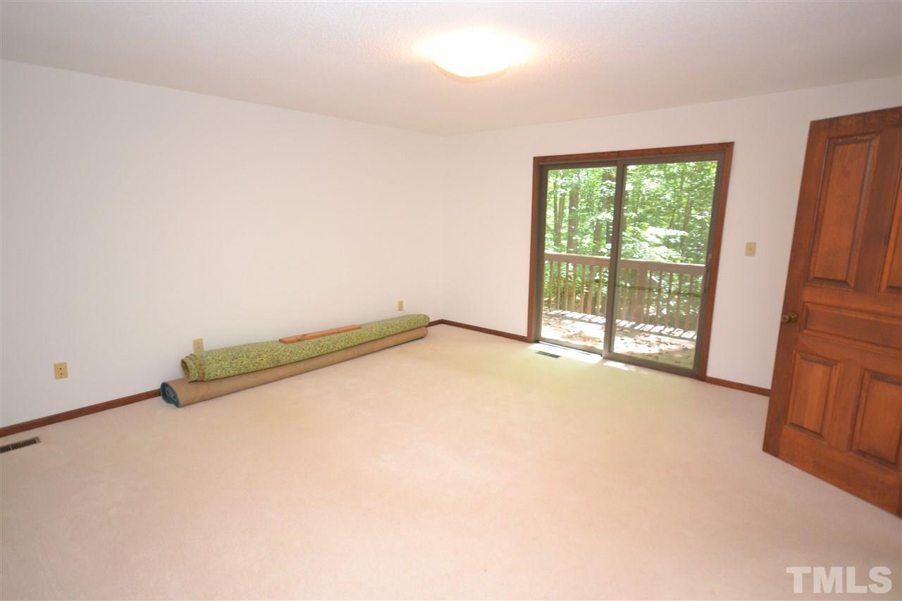 2400 Windsor Trail Raleigh, NC 27615 - Photo 9 of 19 an empty room with sliding door