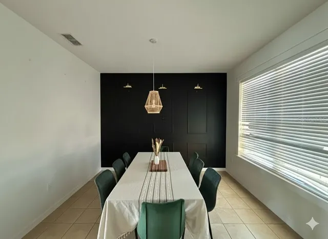 a front view of a house with pool