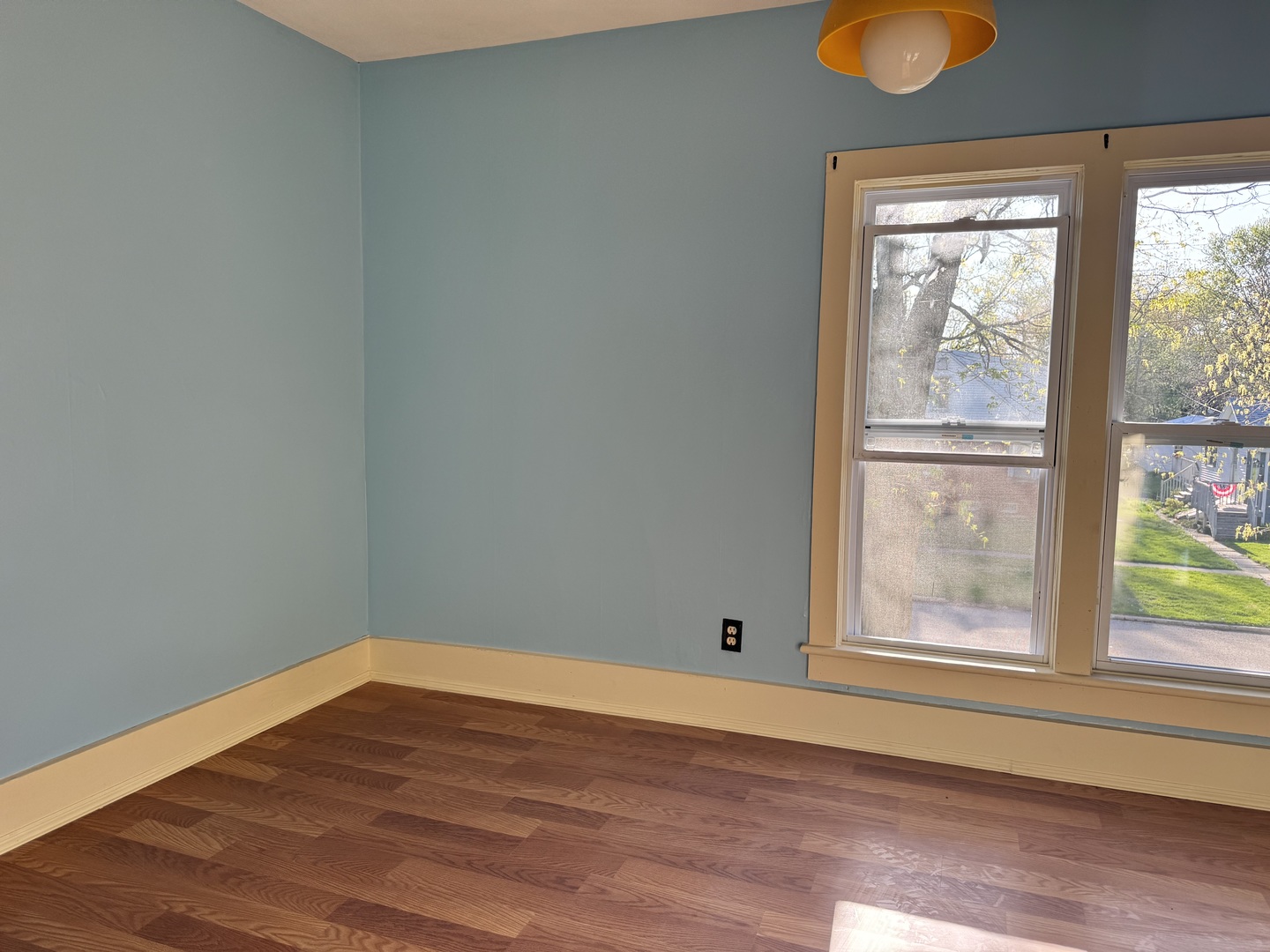 410 3rd Street Mendota, IL 61342 - Photo 13 of 18 a view of empty room with wooden floor and fan