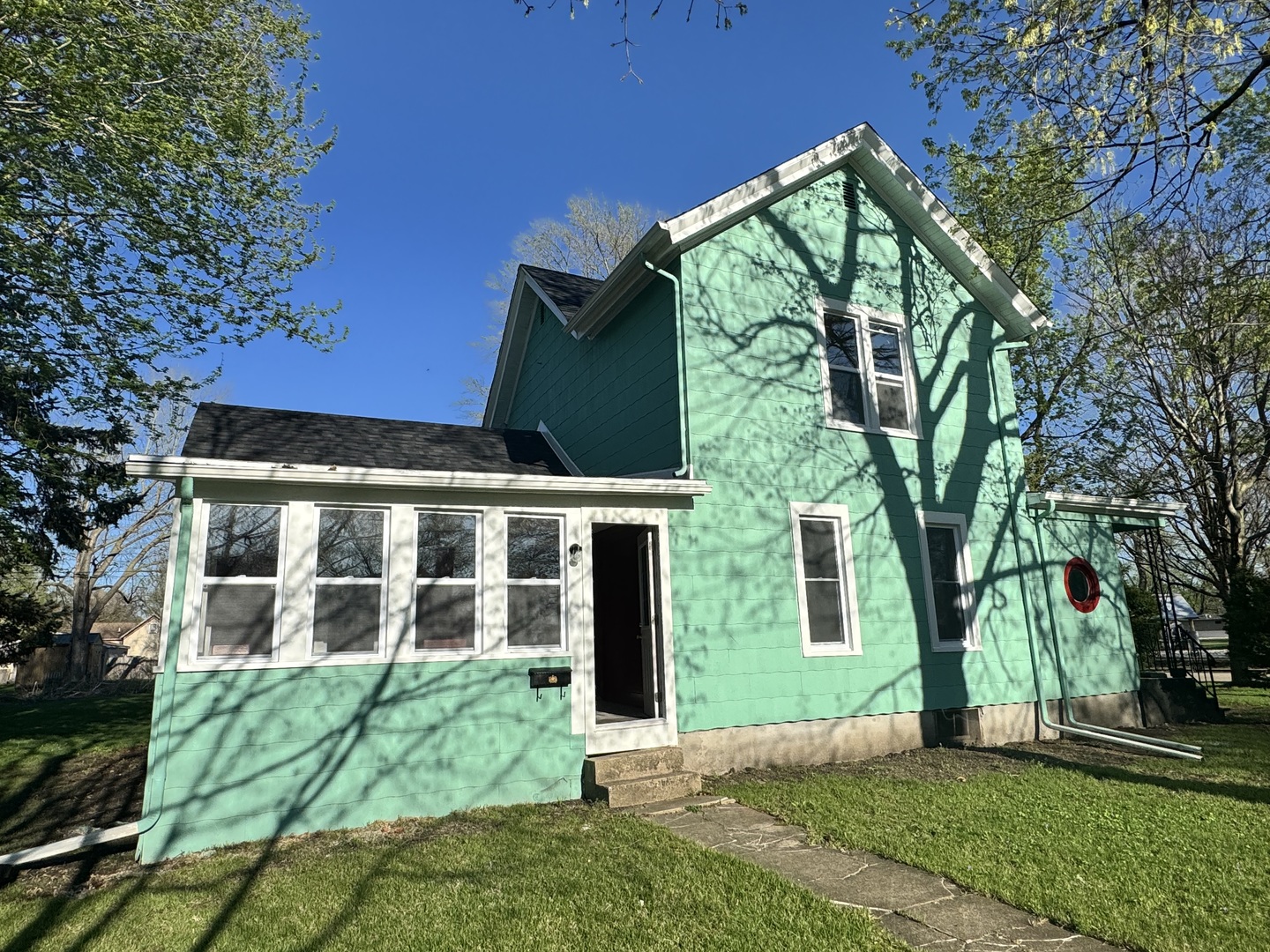 410 3rd Street Mendota, IL 61342 - Photo 17 of 18 front view of a house with a yard