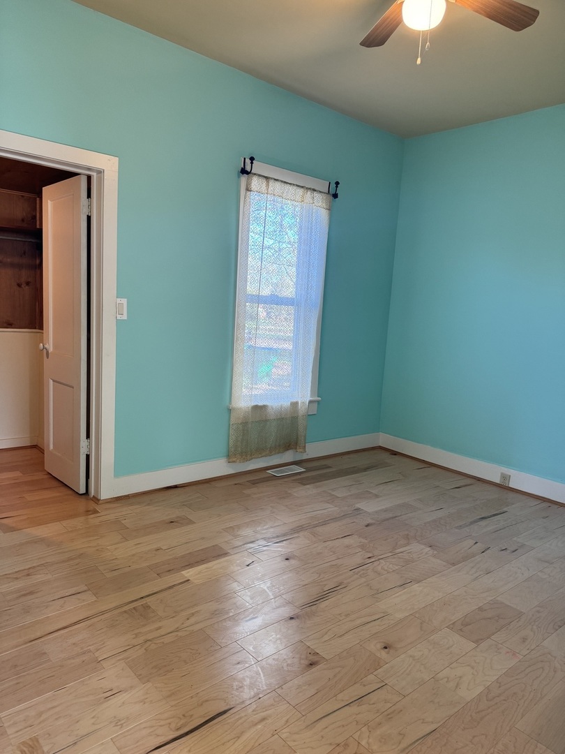 410 3rd Street Mendota, IL 61342 - Photo 5 of 18 a view of empty room with window