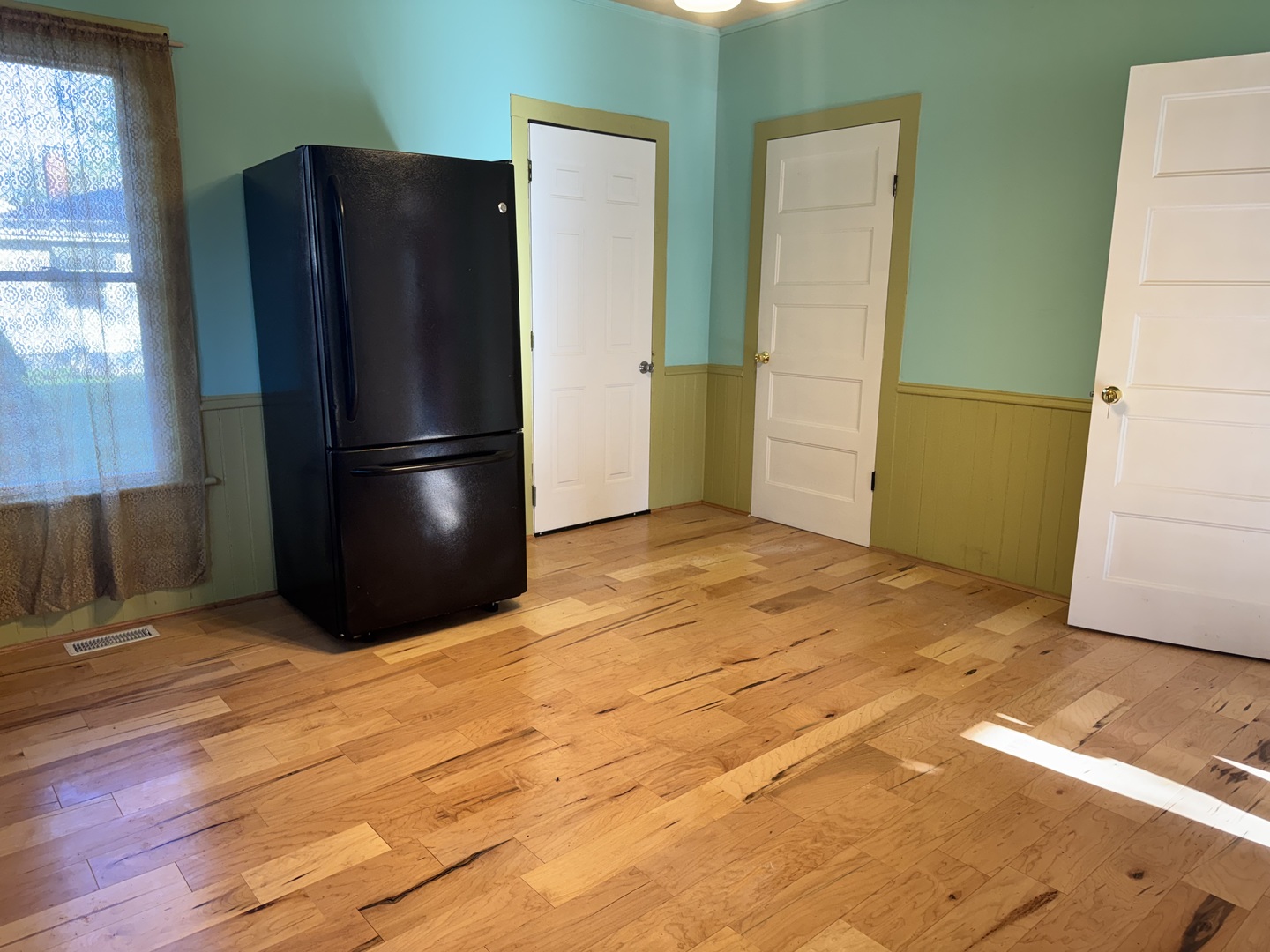410 3rd Street Mendota, IL 61342 - Photo 8 of 18 a kitchen with a refrigerator freezer and a dishwasher