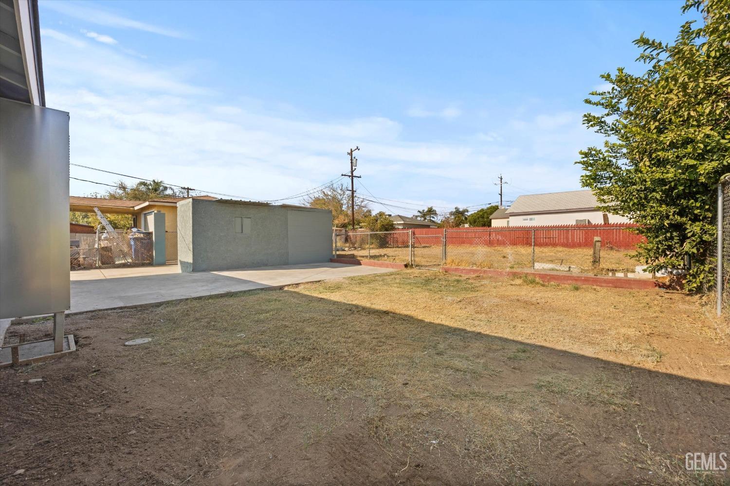 Undisclosed Address Bakersfield, CA 93306 - Photo 25 of 29 a view of a house with a yard