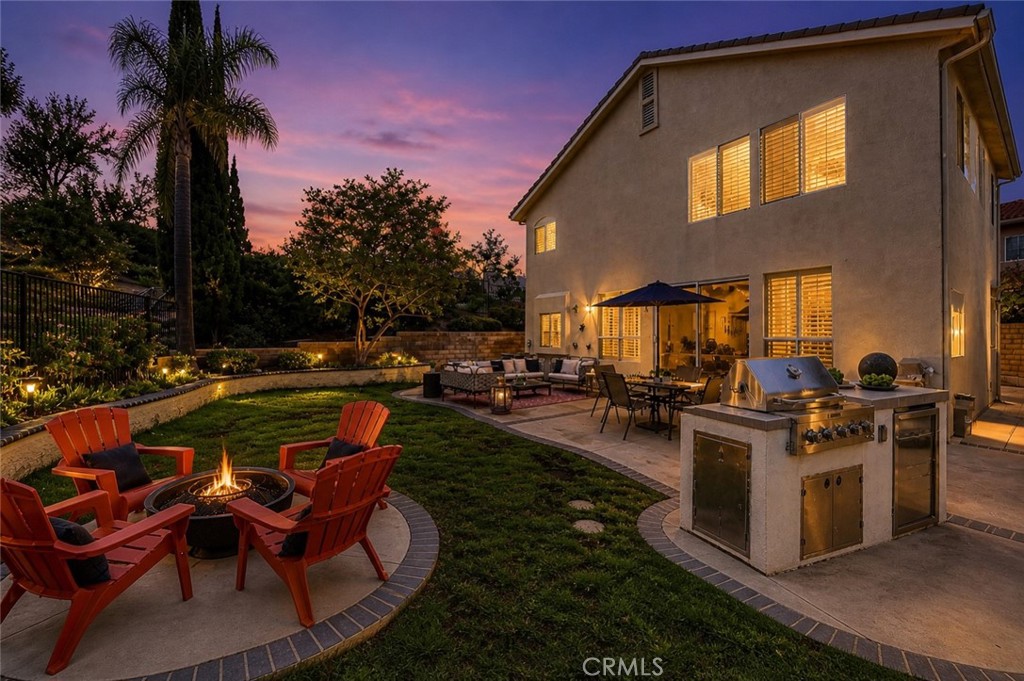 19901 Mid Pines Lane Porter Ranch, CA 91326 - Photo 12 of 23 Backyard Twilight (This picture has been digitally altered)
