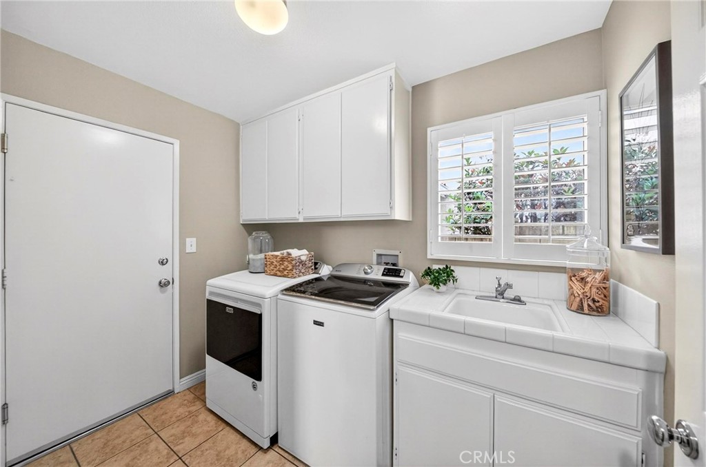 19901 Mid Pines Lane Porter Ranch, CA 91326 - Photo 19 of 23 Downstairs Laundry Room