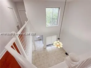 a view of an empty room with window