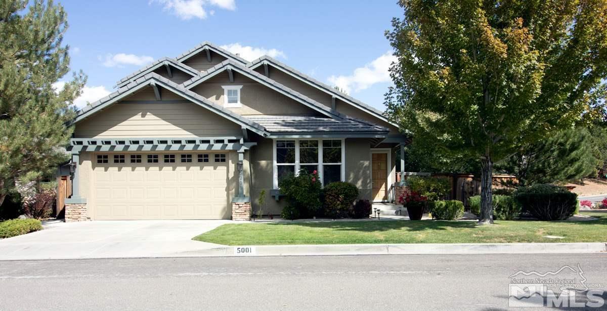 5001 Fall Colors Court Reno, NV 89519 - Photo 2 of 36 a front view of a house with a garden and plants