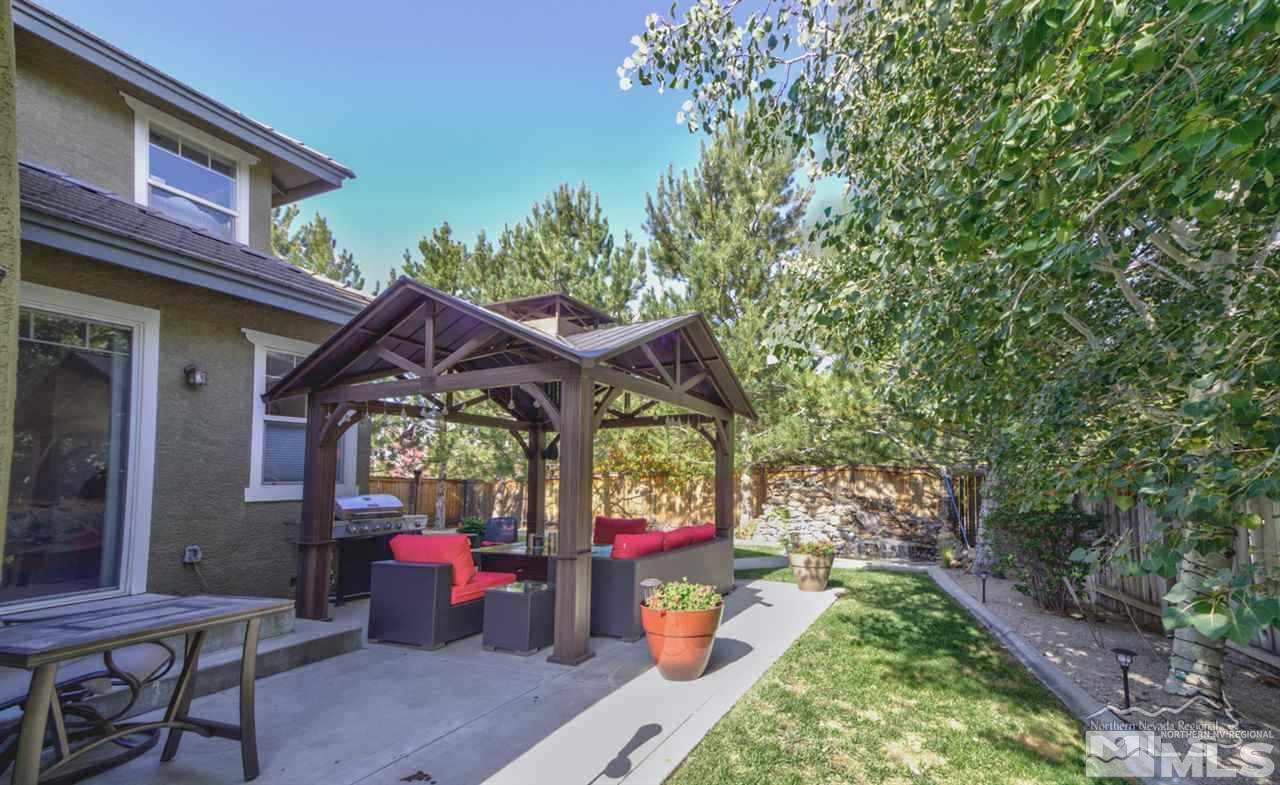 5001 Fall Colors Court Reno, NV 89519 - Photo 31 of 36 a view of a chairs and table in the patio
