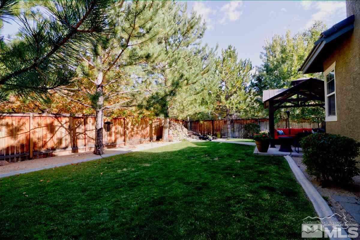 5001 Fall Colors Court Reno, NV 89519 - Photo 33 of 36 a view of yard with green space and trees