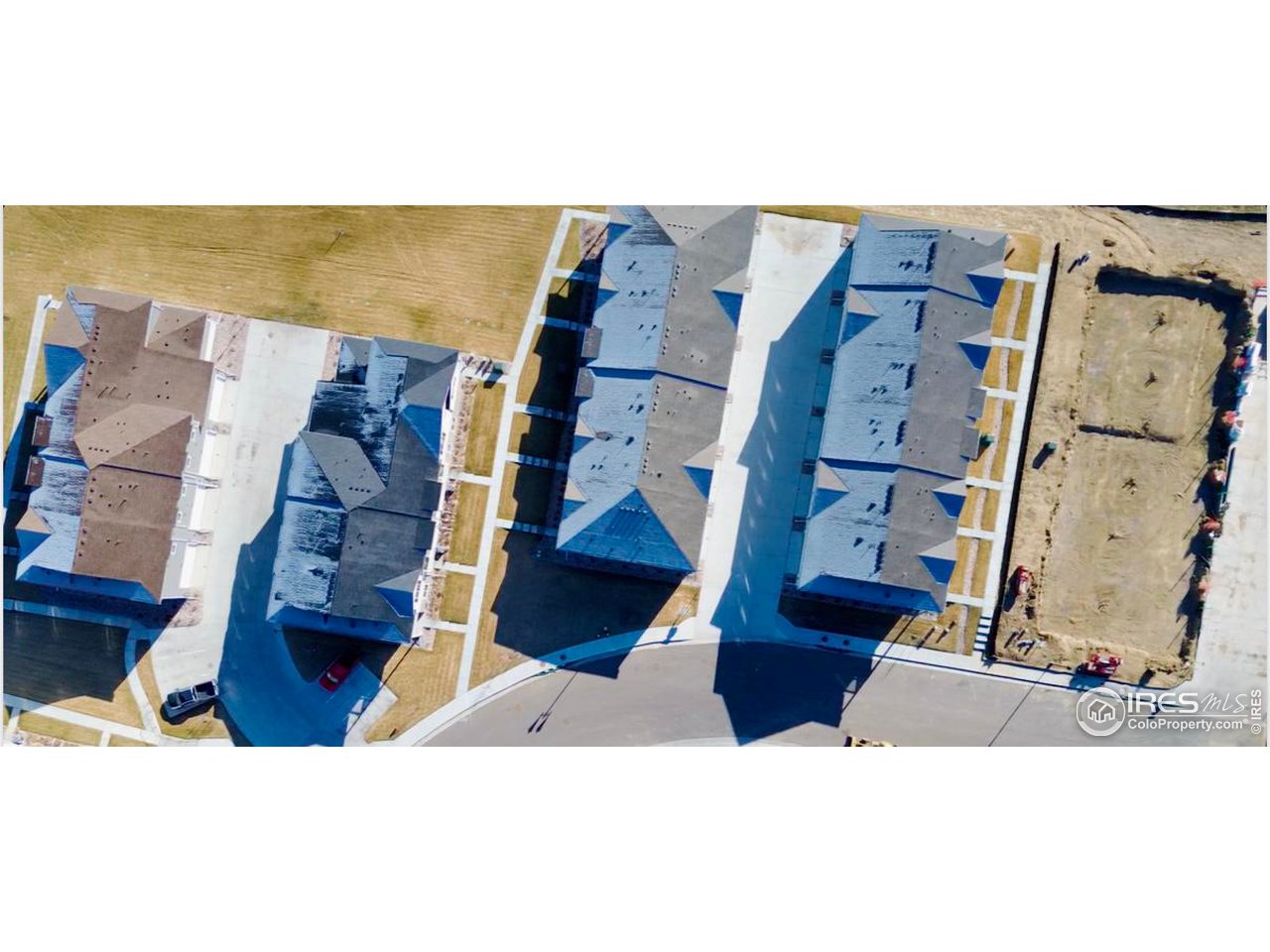 127 Robin Road Johnstown, CO 80534 - Photo 15 of 24 an aerial view of residential houses with outdoor space and parking