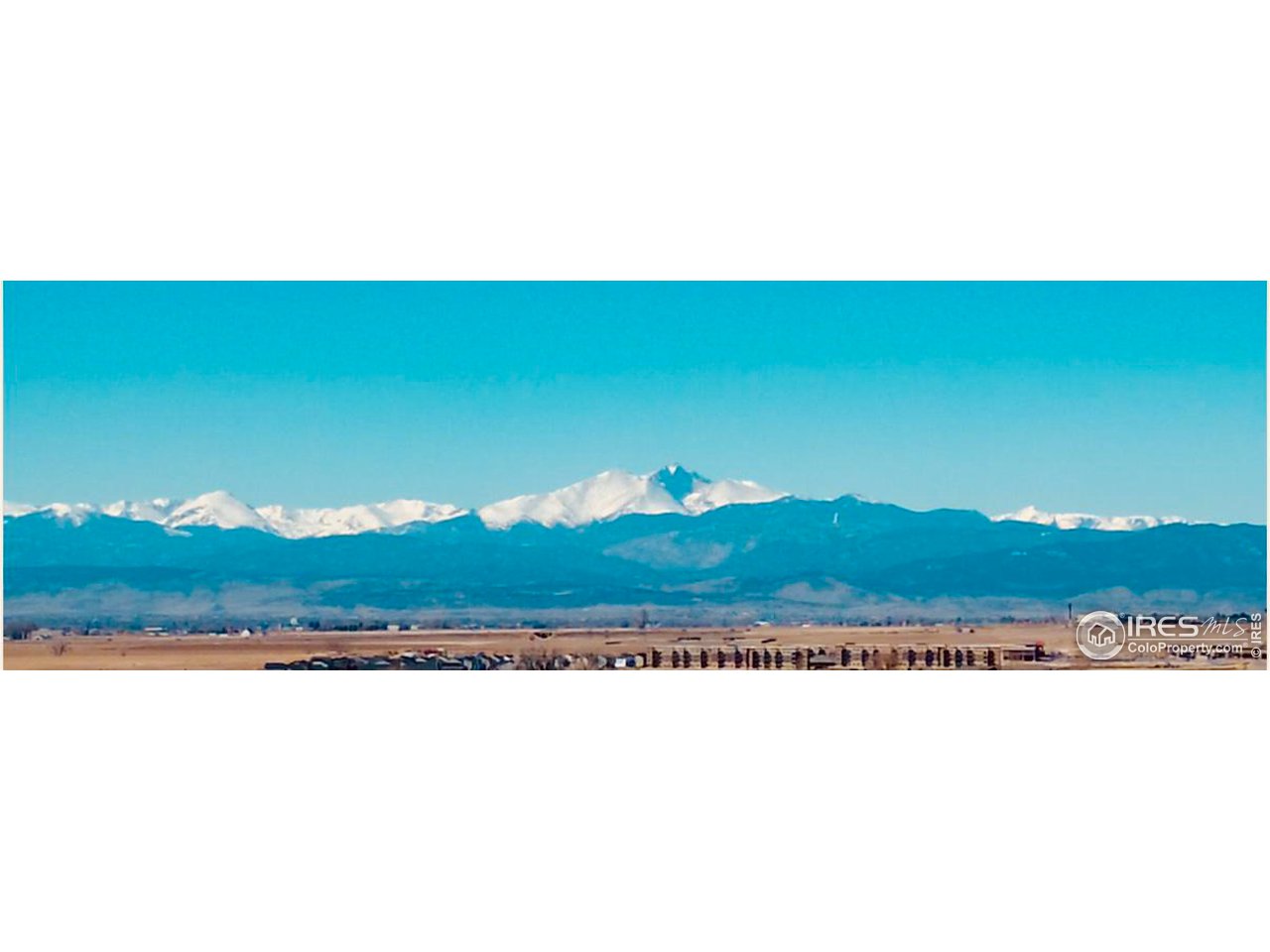 127 Robin Road Johnstown, CO 80534 - Photo 18 of 24 a view of a field with an ocean