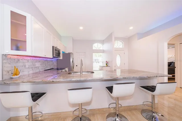 a bathroom with a sink and a bathtub