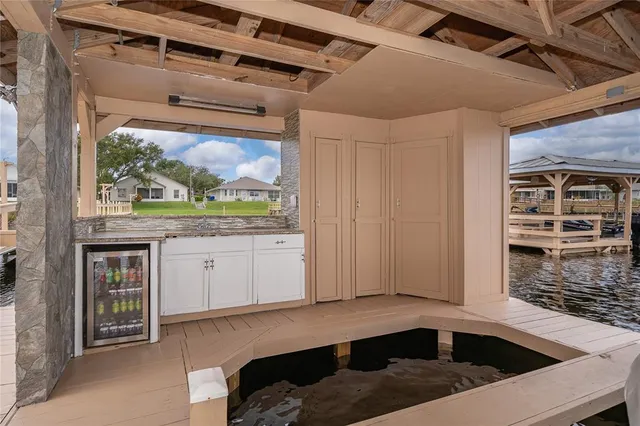 an aerial view of a house with a ocean view