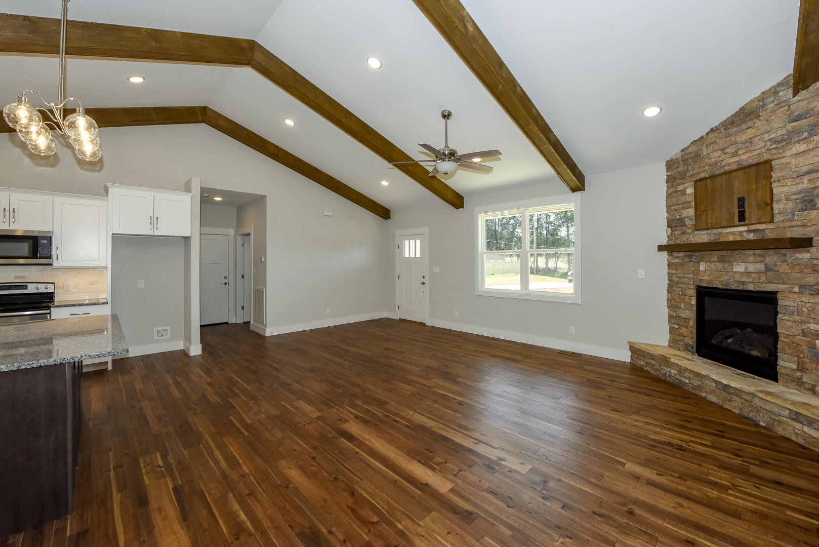 3059 New Blockhouse Road Maryville, TN 37803 - Photo 12 of 33 a view of an empty room with a fireplace and a window