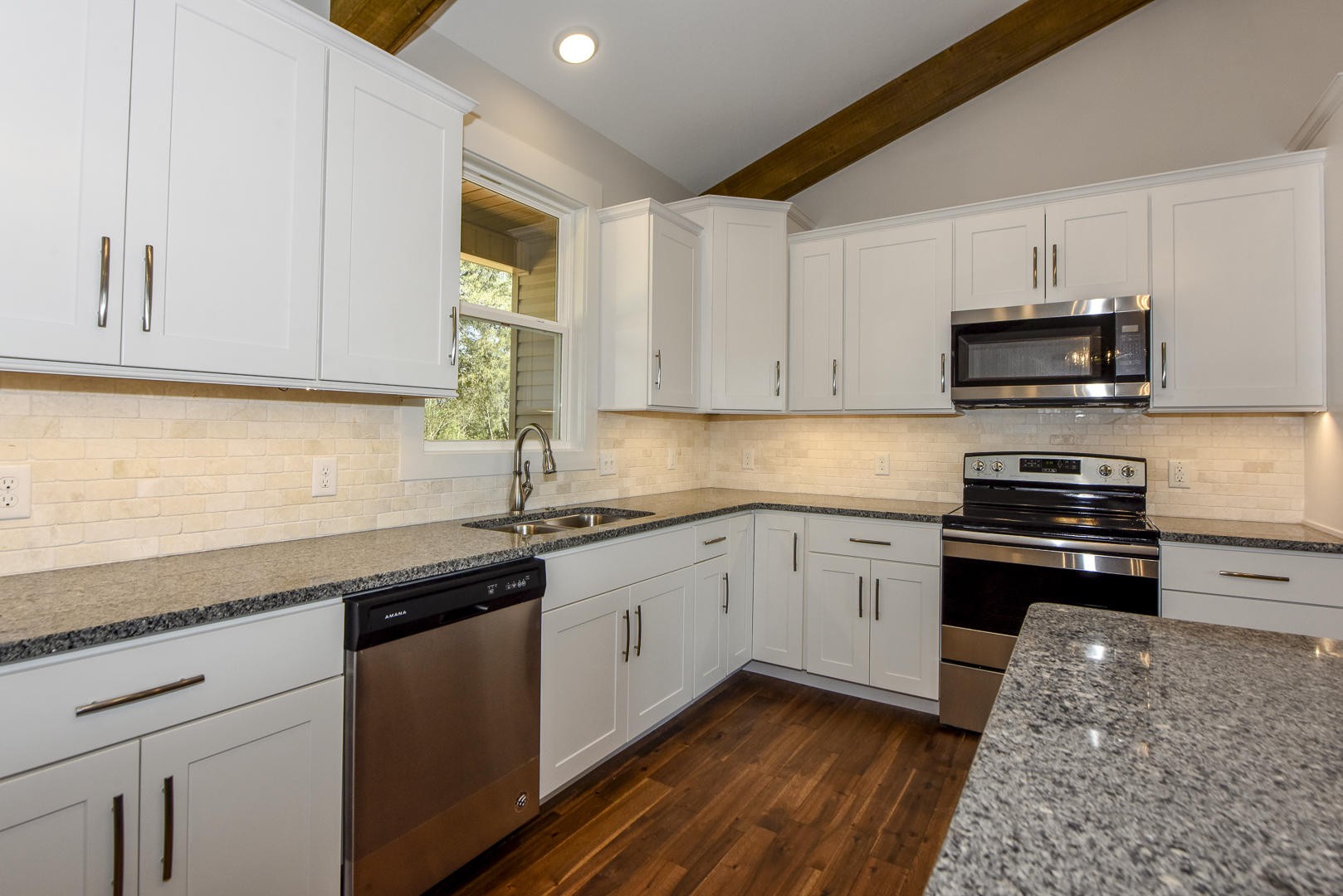 3059 New Blockhouse Road Maryville, TN 37803 - Photo 15 of 33 a kitchen with granite countertop cabinets and black stainless steel appliances