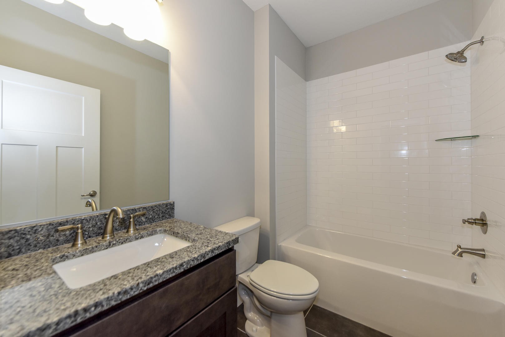 3059 New Blockhouse Road Maryville, TN 37803 - Photo 21 of 33 a bathroom with a granite countertop sink a toilet and bathtub