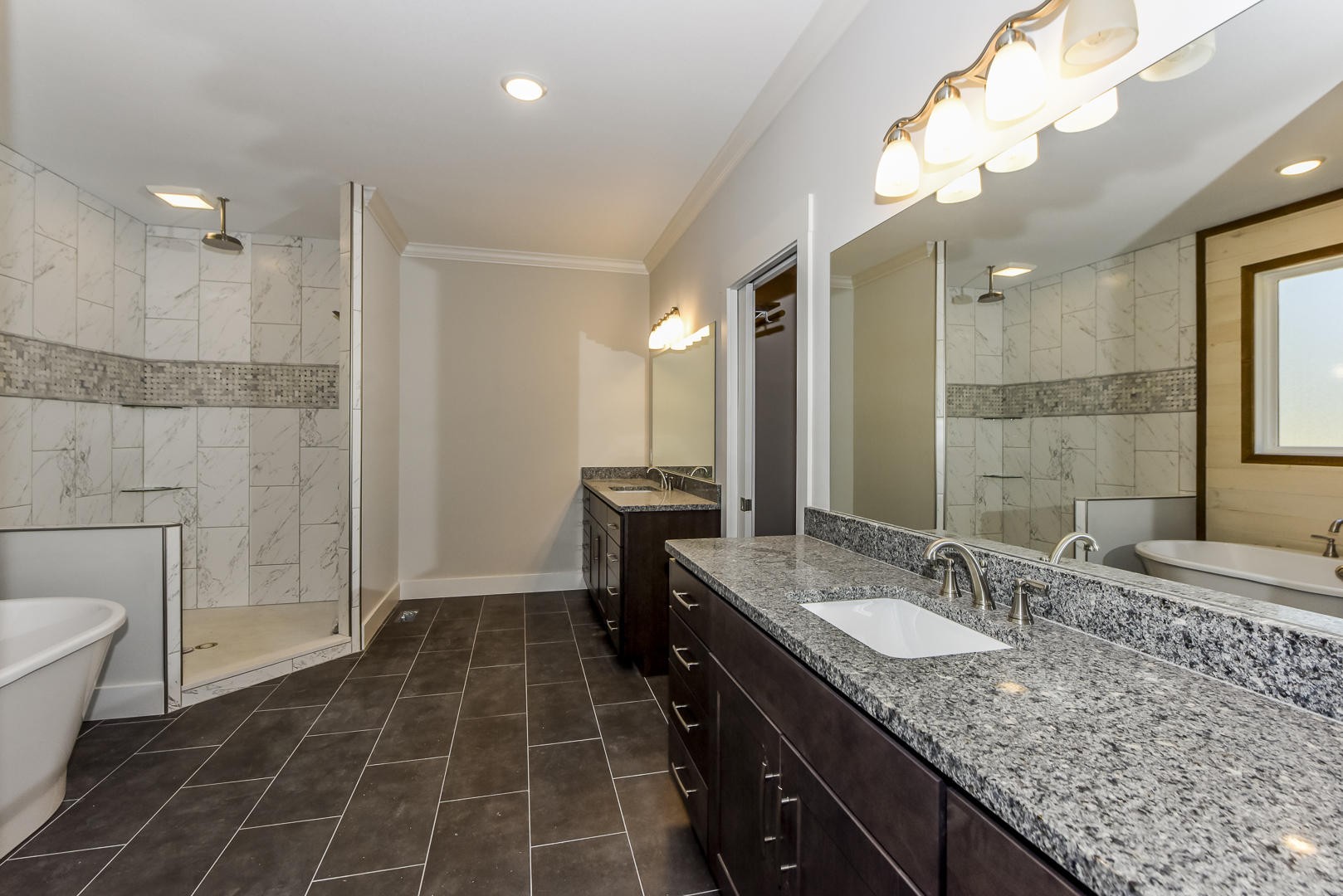 3059 New Blockhouse Road Maryville, TN 37803 - Photo 25 of 33 a bathroom with a granite countertop sink a toilet a mirror and shower