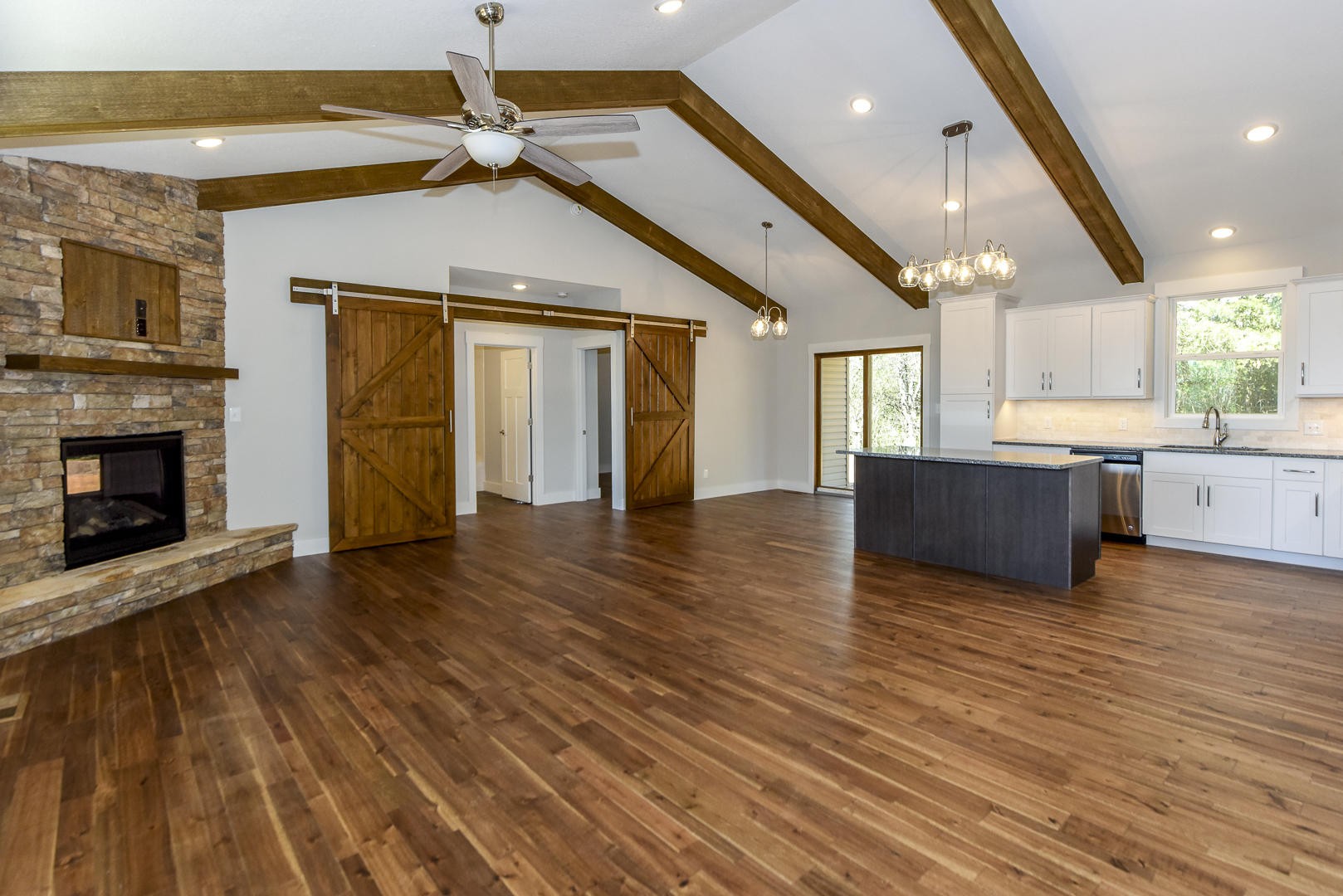 3059 New Blockhouse Road Maryville, TN 37803 - Photo 3 of 33 a view of a livingroom with wooden floor and a kitchen