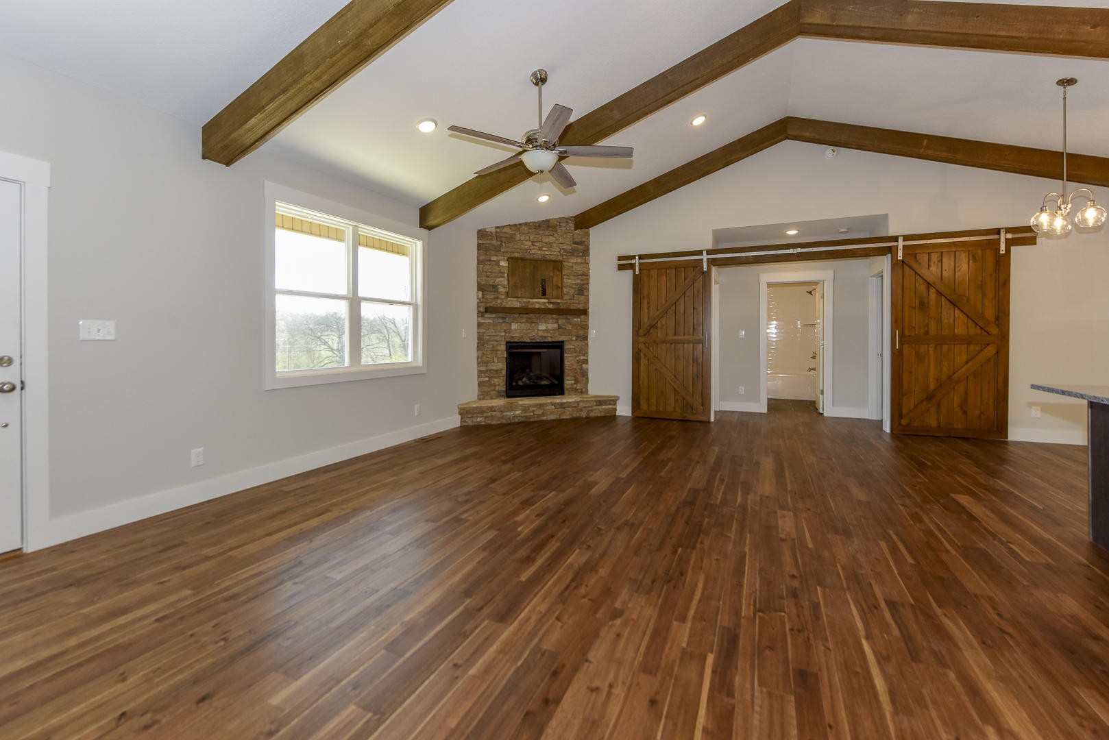 3059 New Blockhouse Road Maryville, TN 37803 - Photo 5 of 33 a view of empty room with wooden floor and fireplace
