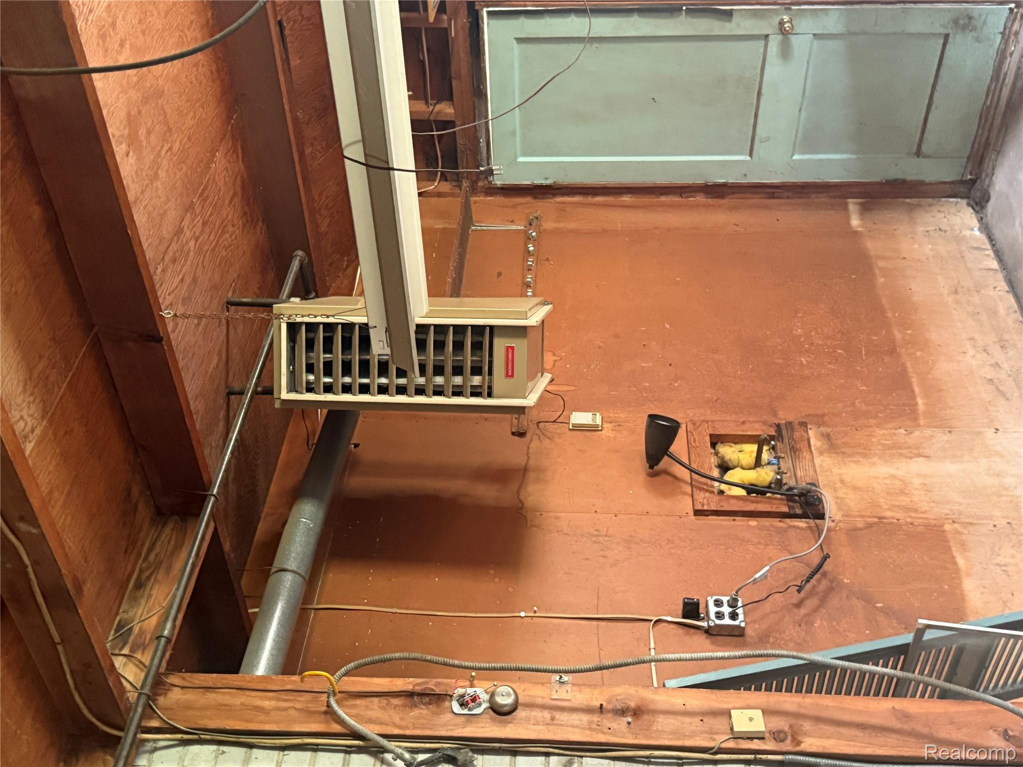 3176 East Fisher Road Bay City, MI 48706 - Photo 19 of 25 Basement with a heating unit