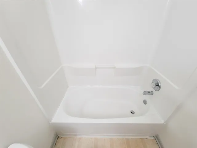 a close up of a bathtub