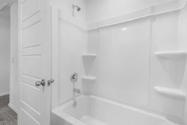 a bathroom with a bathtub