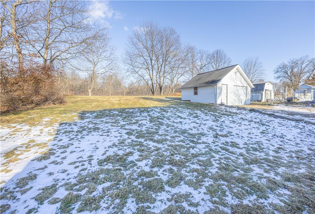 422 New Castle Road Butler, PA 16001 - Photo 24 of 27 a view of a house with a yard and large tree