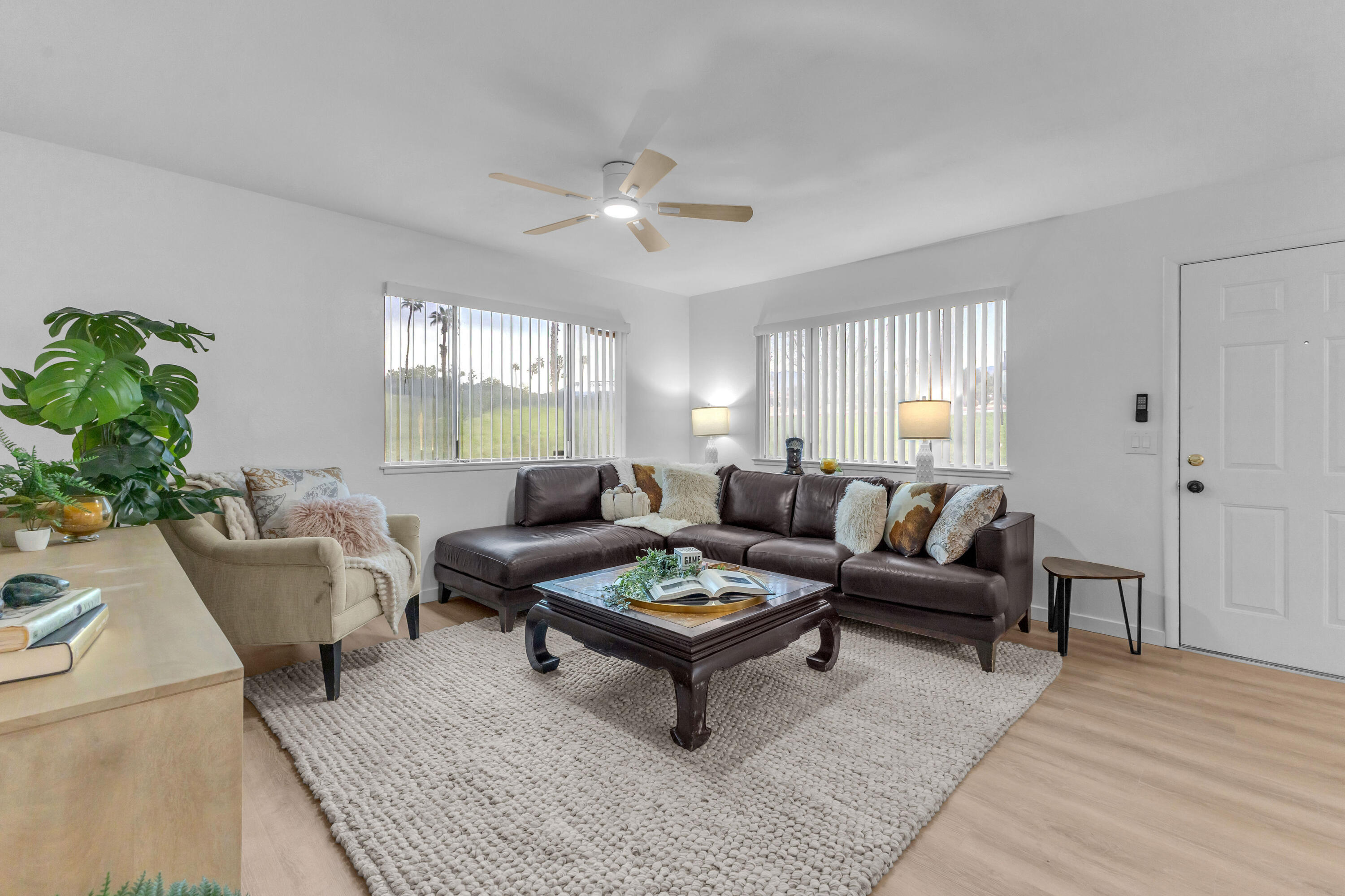72682 Thrush Road, Unit 1 Palm Desert, CA 92260 - Photo 18 of 40 a living room with furniture and a rug