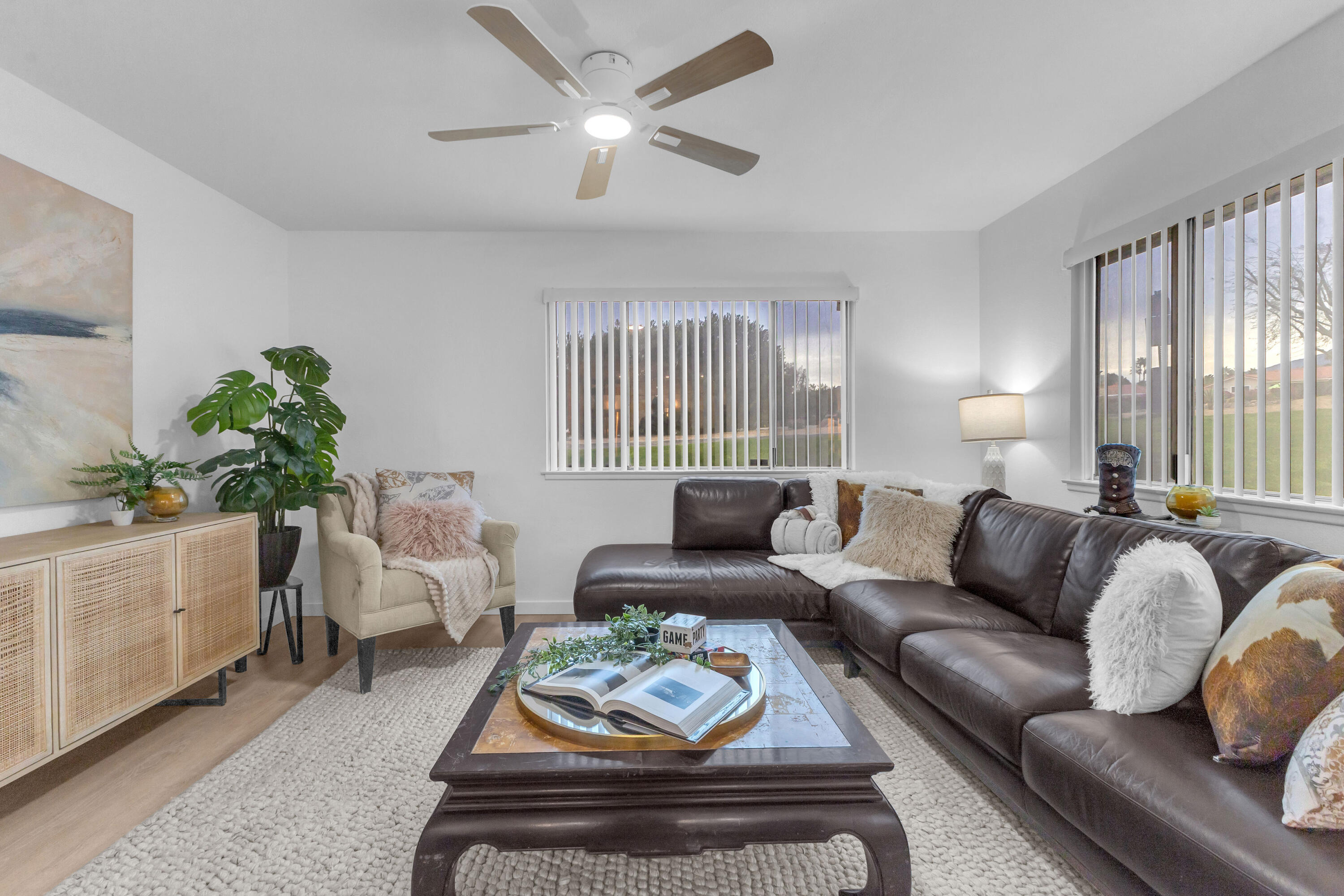72682 Thrush Road, Unit 1 Palm Desert, CA 92260 - Photo 20 of 40 a living room with furniture and a large window