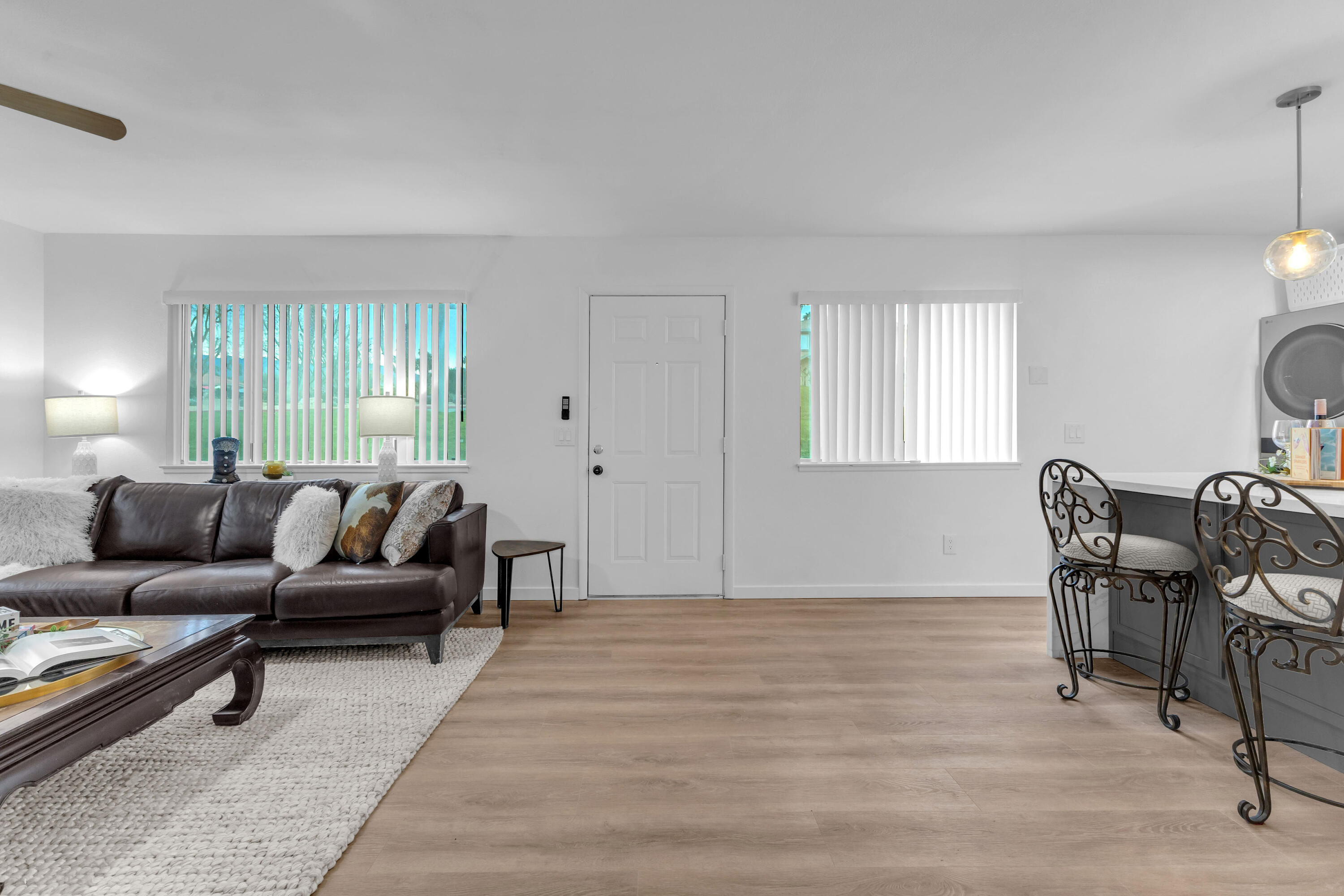 72682 Thrush Road, Unit 1 Palm Desert, CA 92260 - Photo 27 of 40 a living room with furniture and a window
