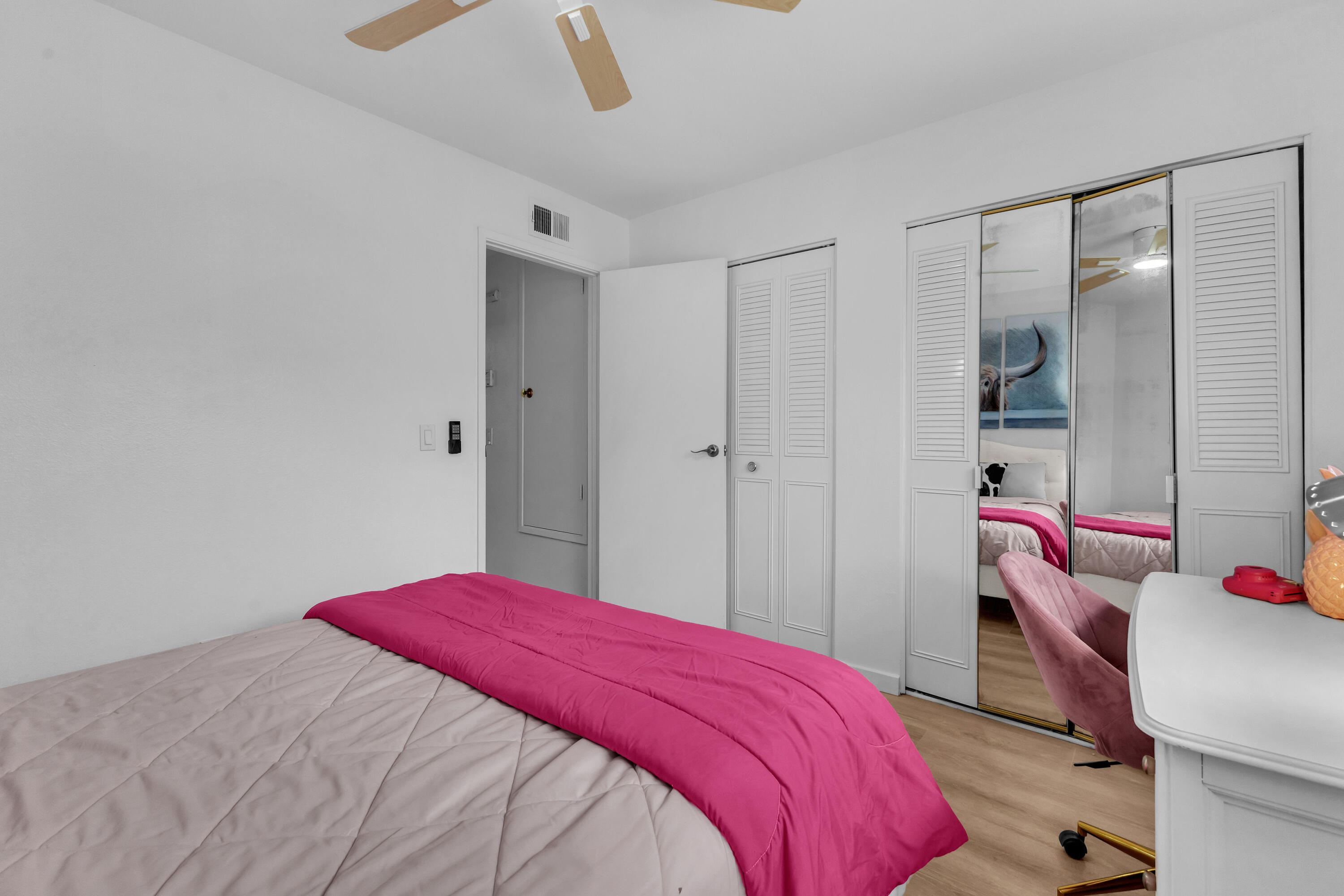 72682 Thrush Road, Unit 1 Palm Desert, CA 92260 - Photo 32 of 40 a bedroom with a bed and a window