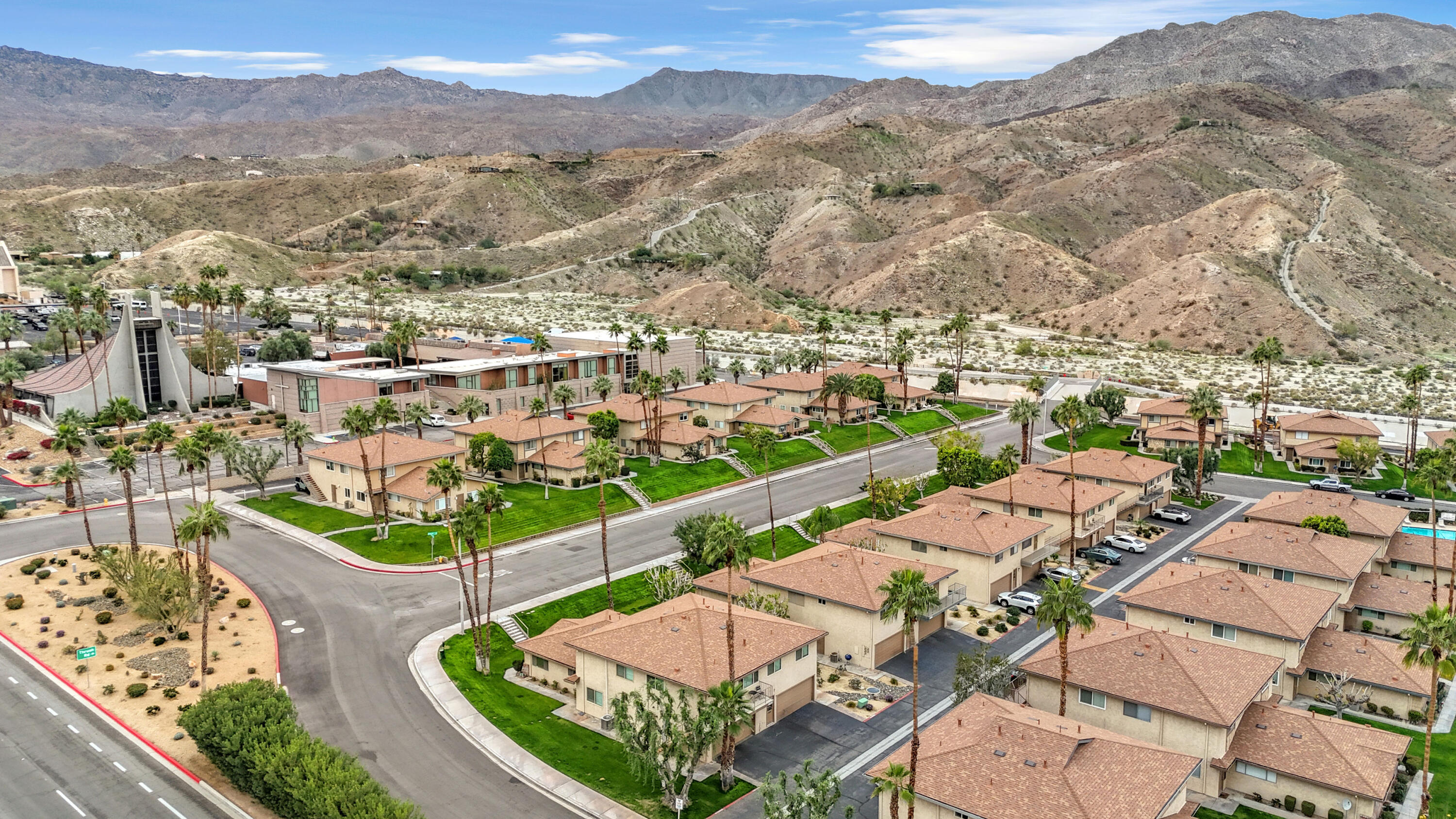 72682 Thrush Road, Unit 1 Palm Desert, CA 92260 - Photo 39 of 40 an aerial view of residential houses with outdoor space and trees