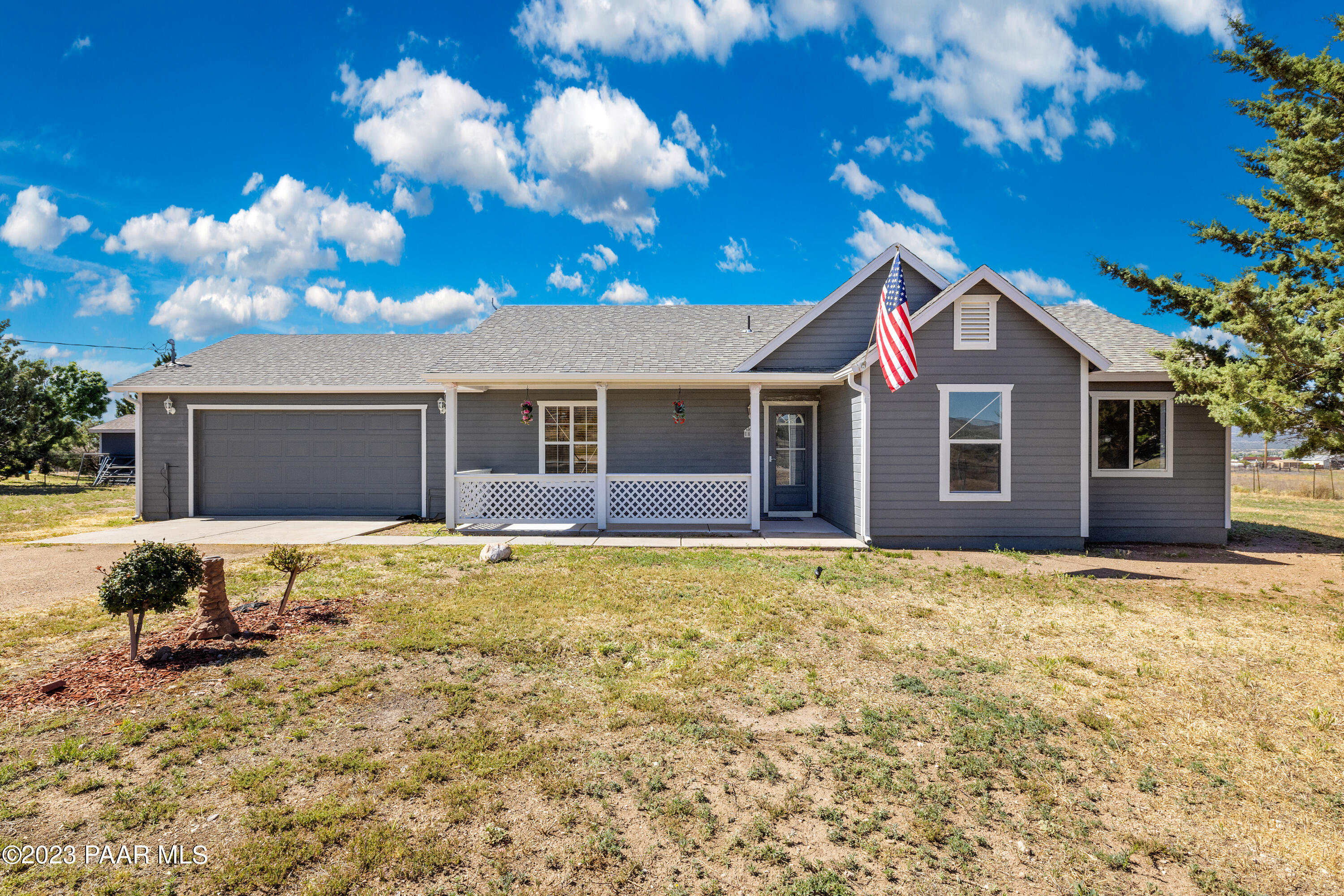 815 West Ahonen Road, Unit 4 Paulden, AZ 86334 - Photo 1 of 27 a house view with a garden space