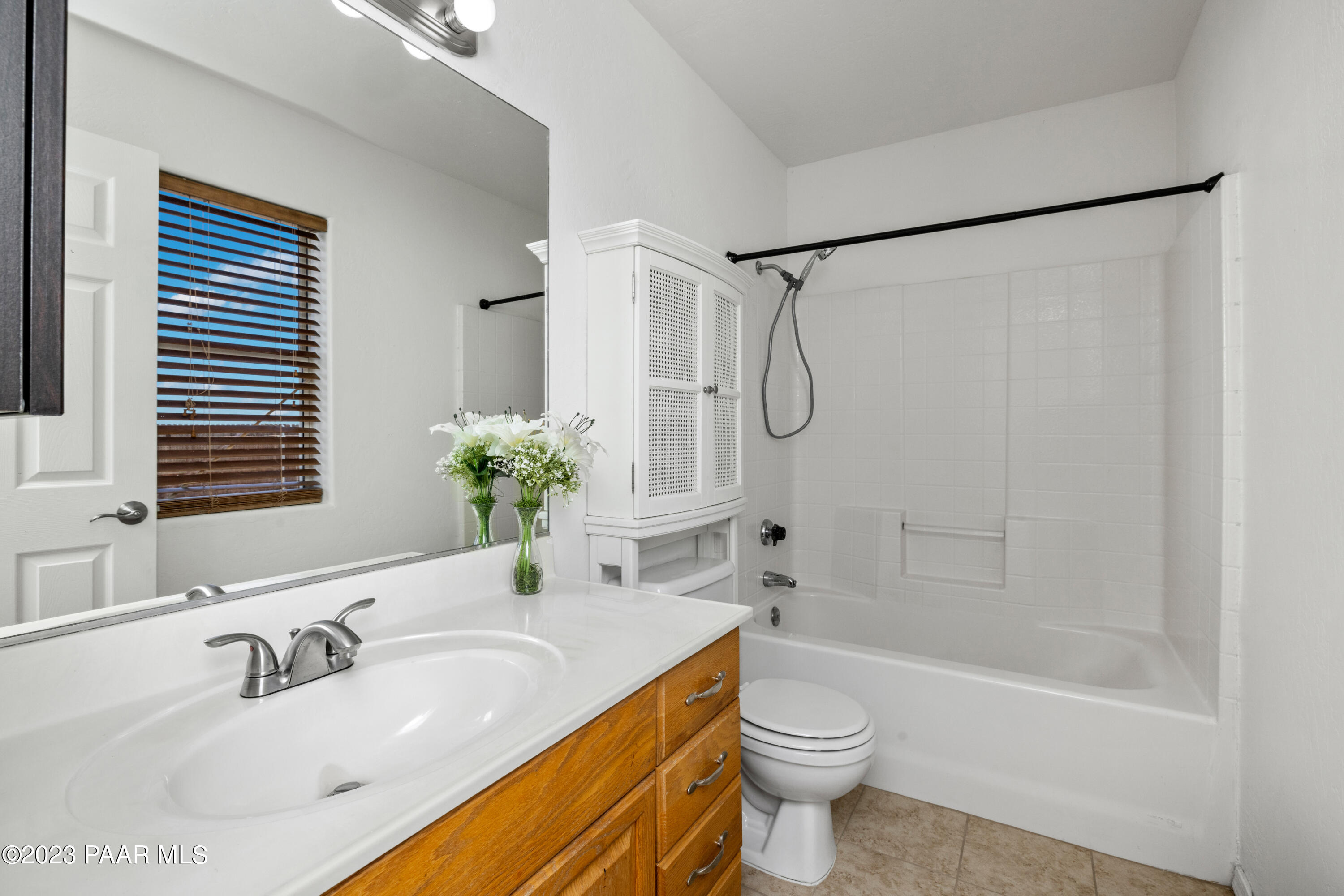 815 West Ahonen Road, Unit 4 Paulden, AZ 86334 - Photo 12 of 27 a bathroom with a sink toilet and shower